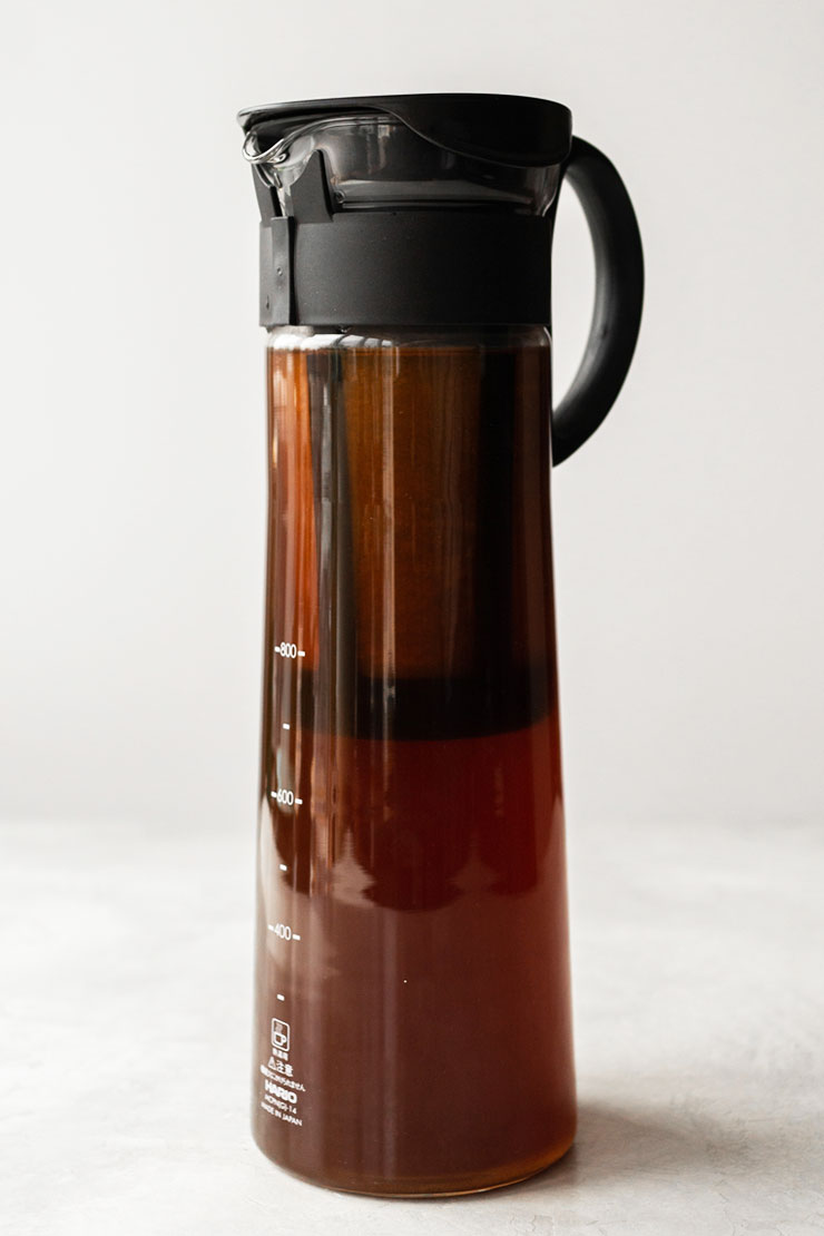 Cold brew coffee in a glass pitcher.