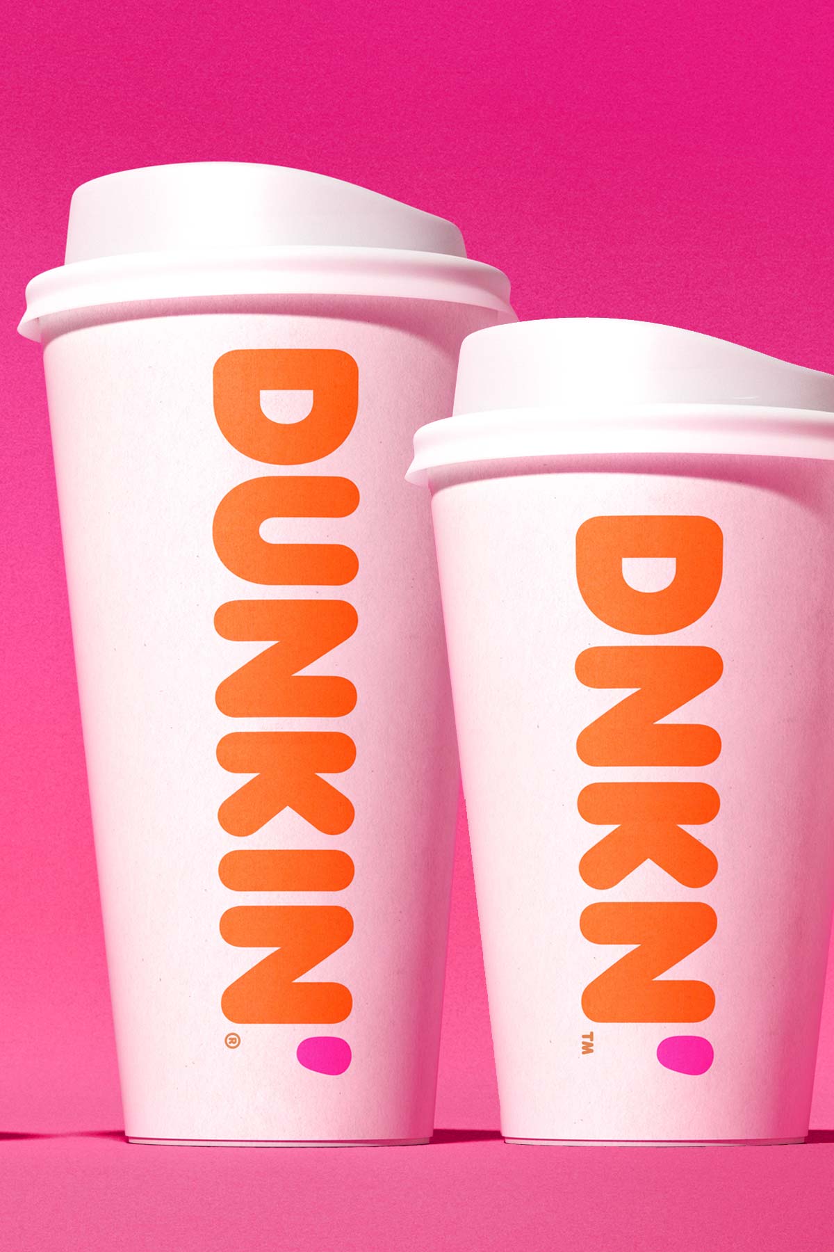 Dunkin' cups next to each other.