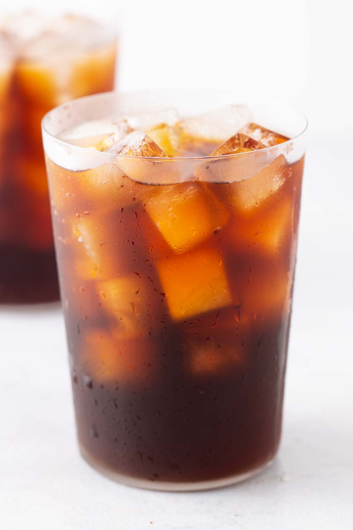 Dunkin' Cold Brew drink in a cup with ice.