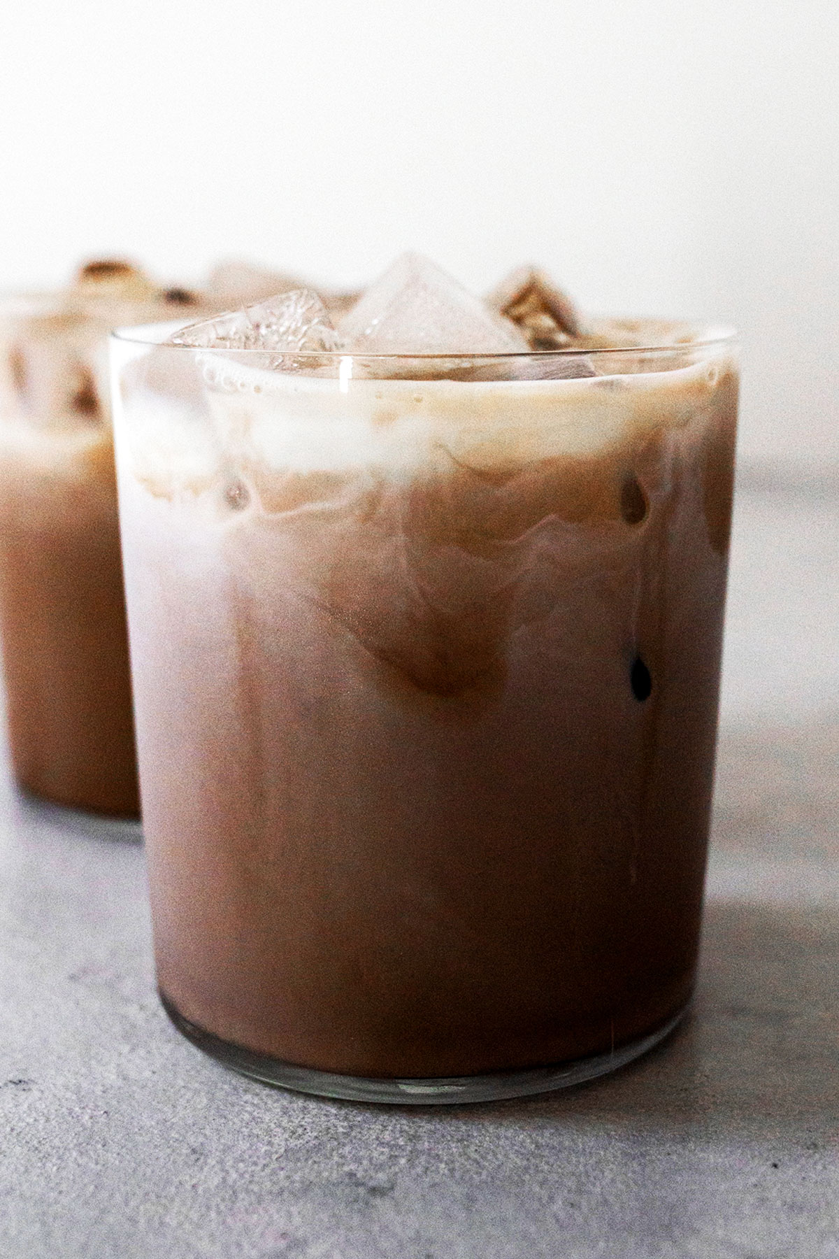 Two glass cups with iced mocha.
