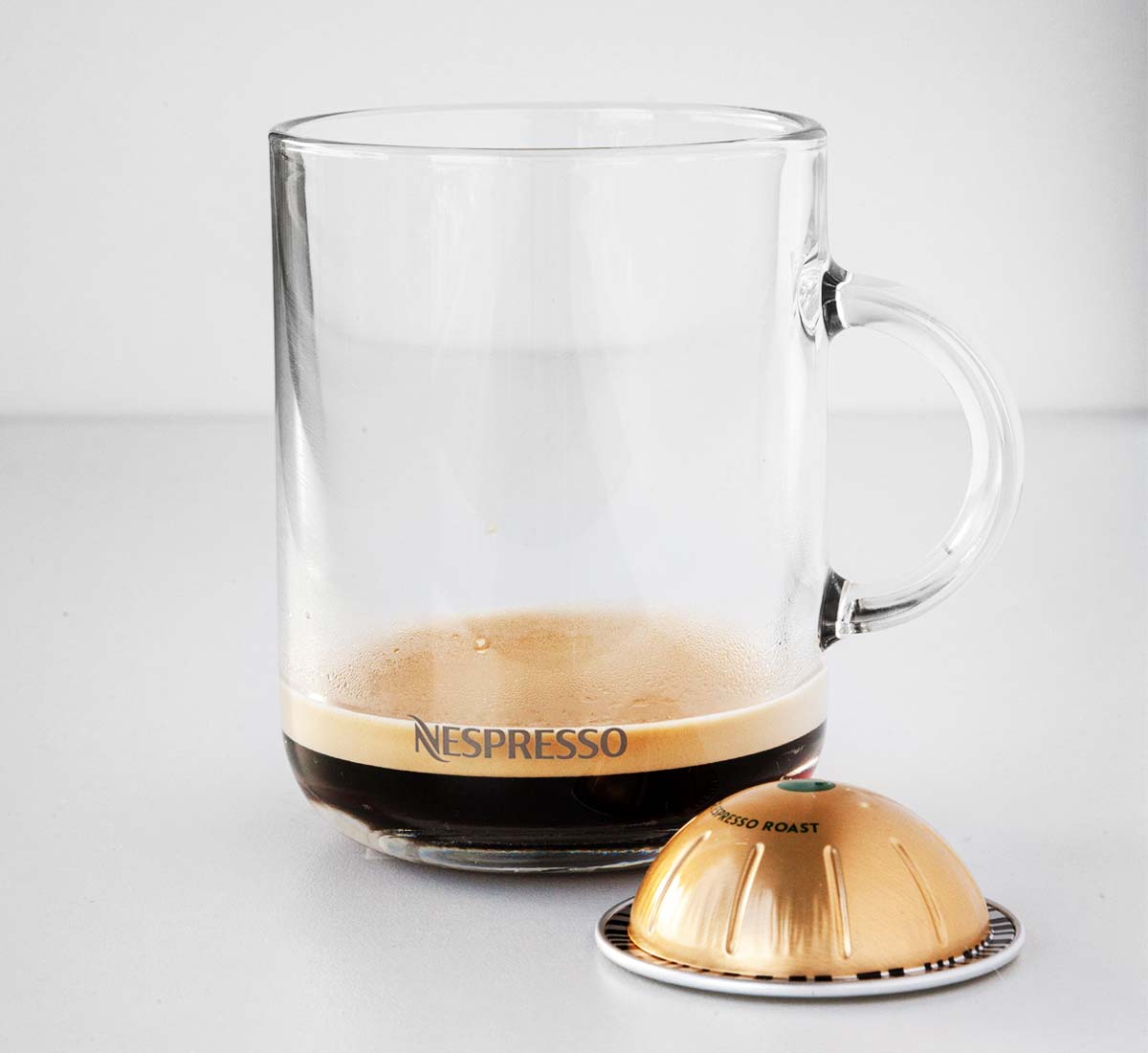Nespresso Starbucks Blonde Espresso capsule with a mug.