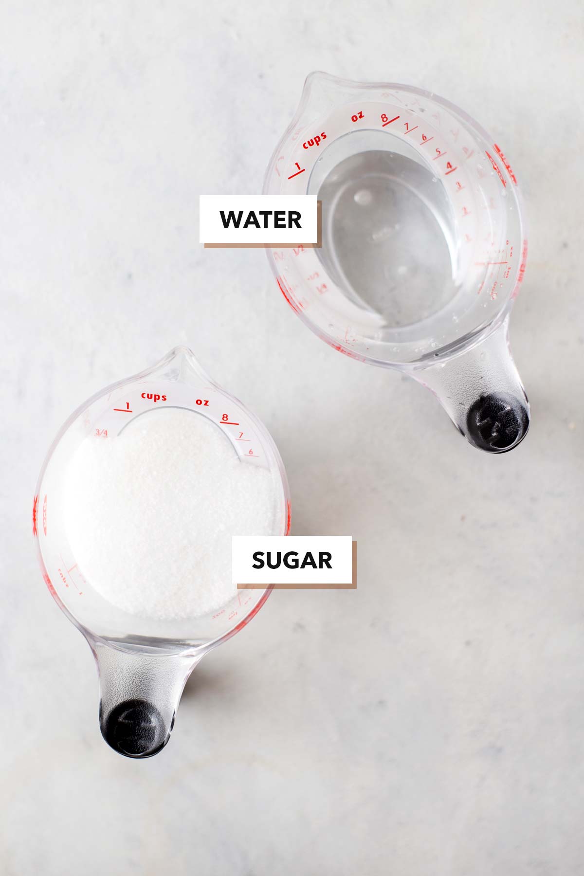 Classic syrup ingredients, a cup of sugar and cup of water.