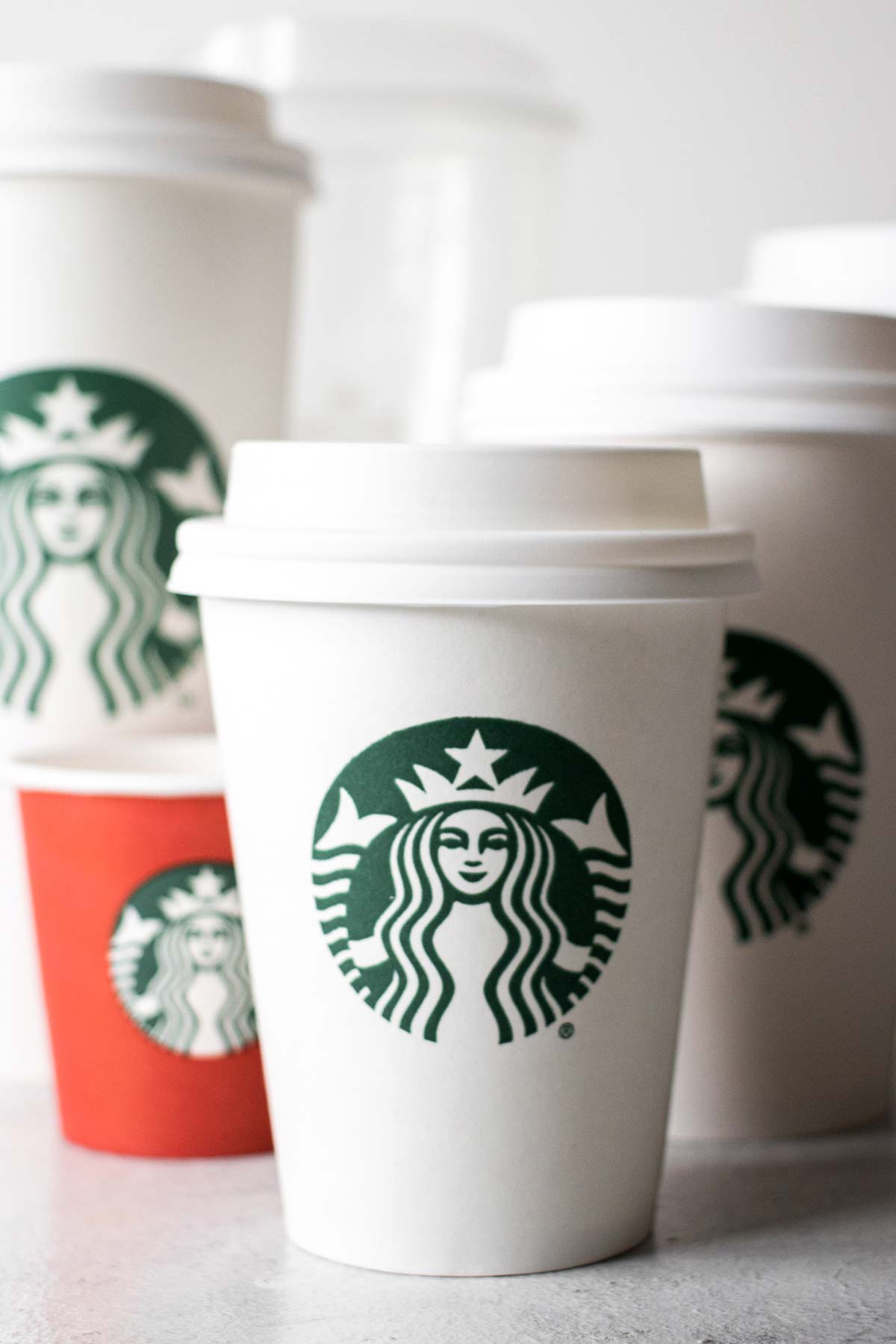 Starbucks cups in different sizes.