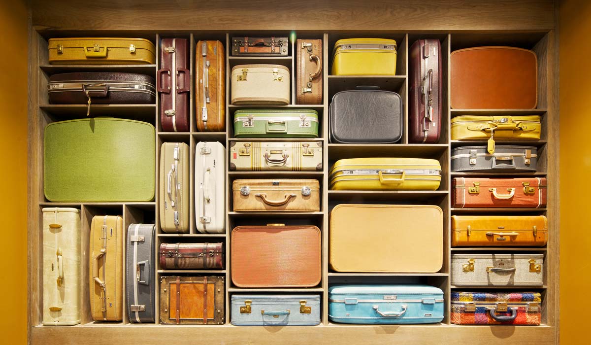 Suitcases in slotted holes.