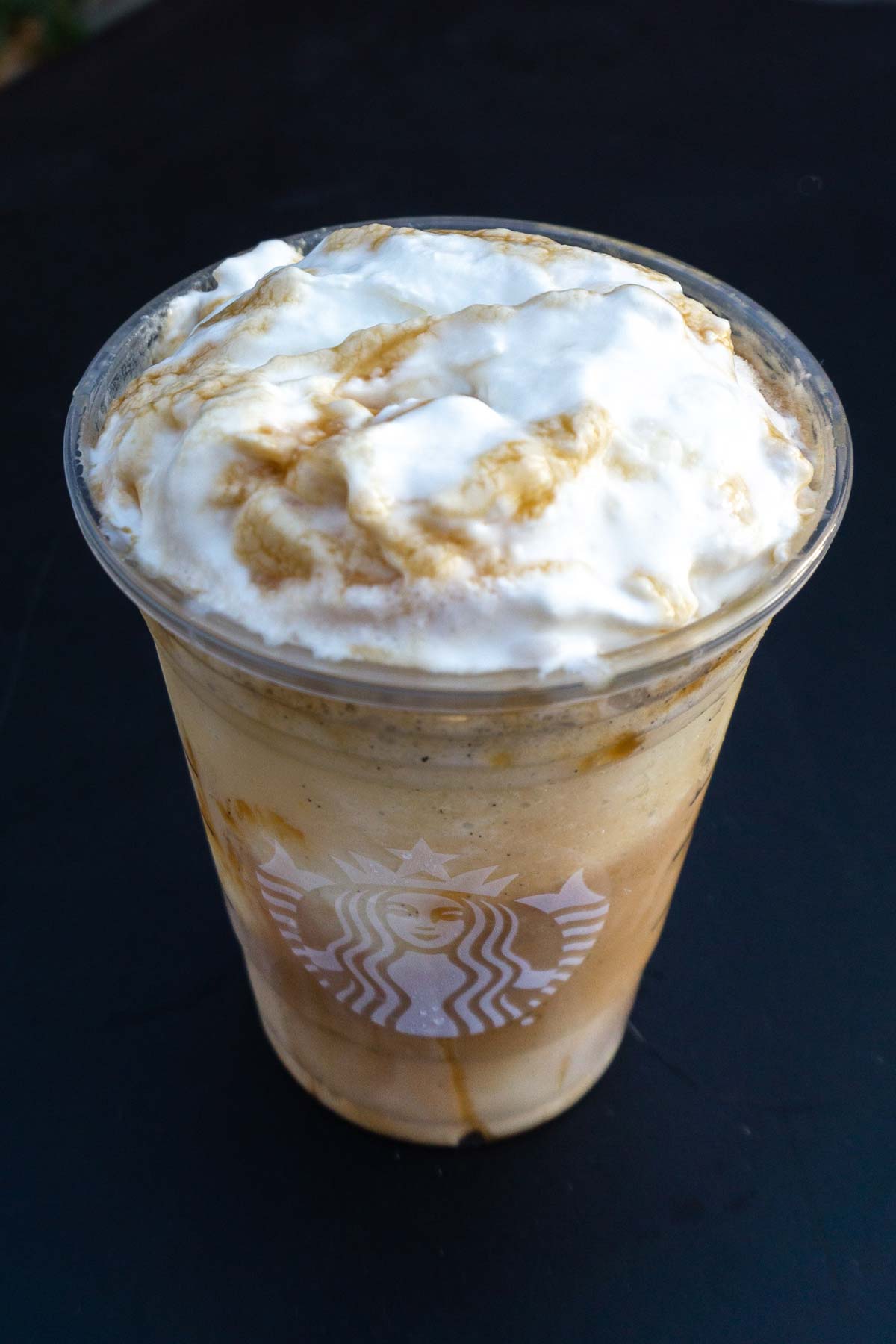 Caramel Macchiato Frappuccino in a cup without the lid.