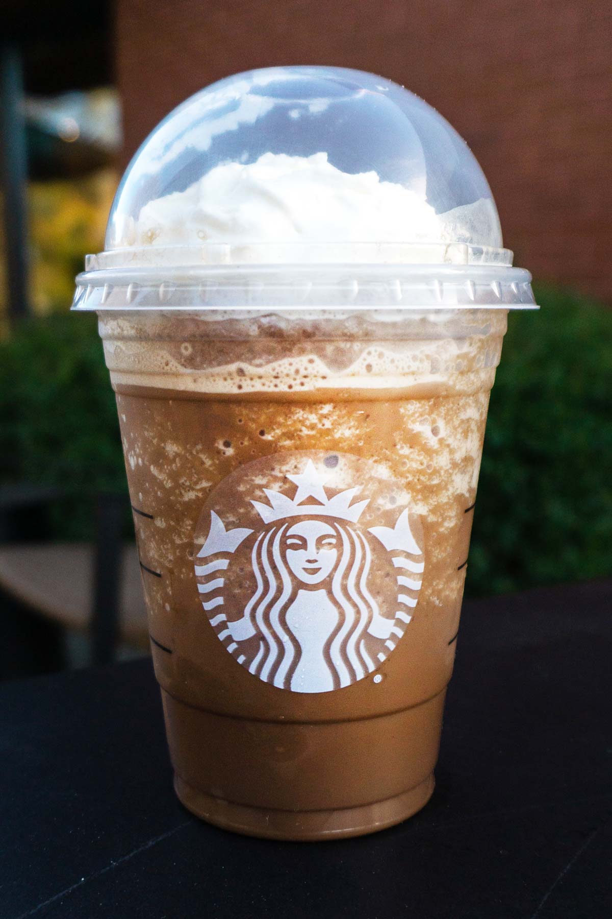 Cocoa Puffs Frappuccino Starbucks drink with whipped cream.