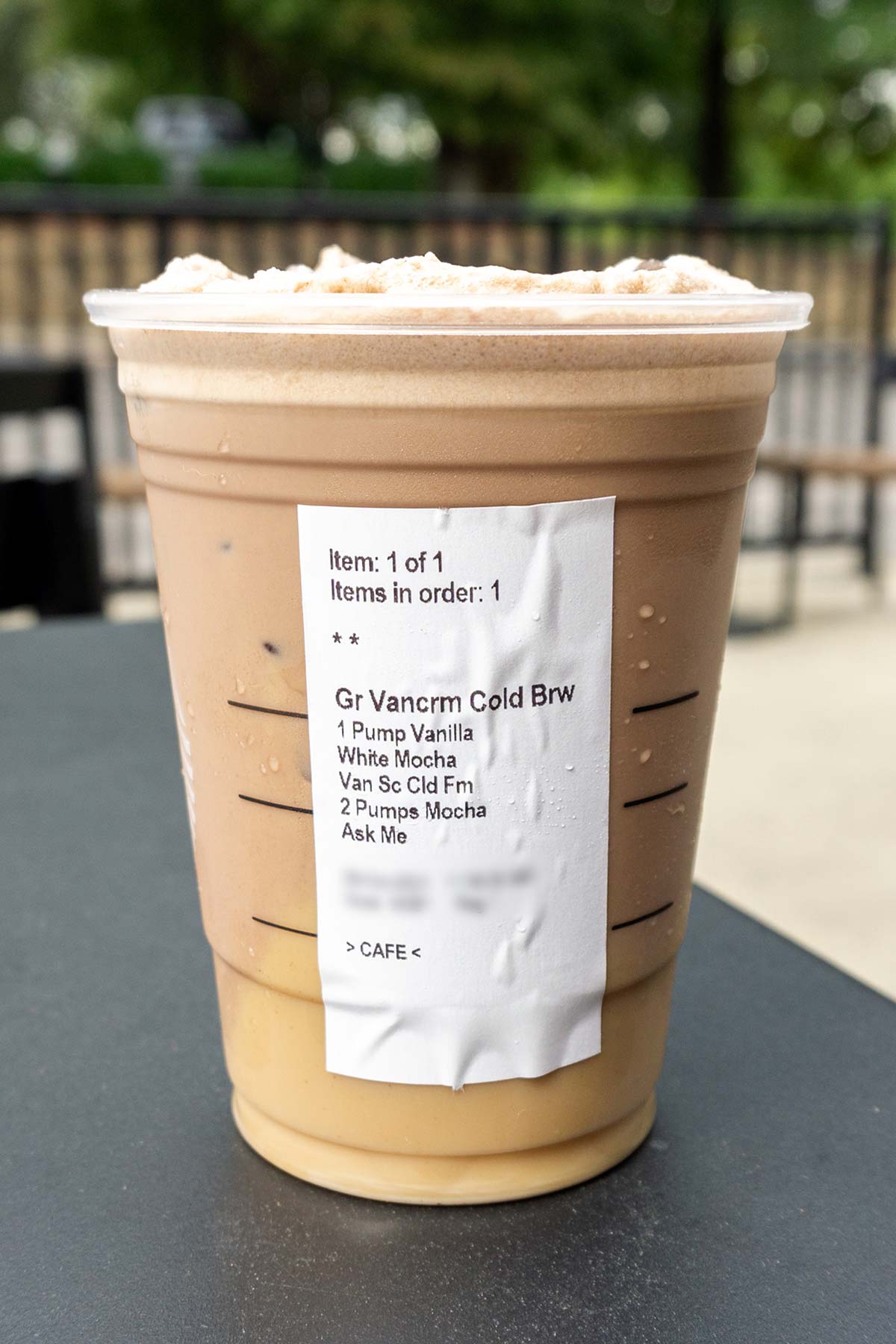 Cookies and Cream Cold Brew secret menu drink with Starbucks order label.