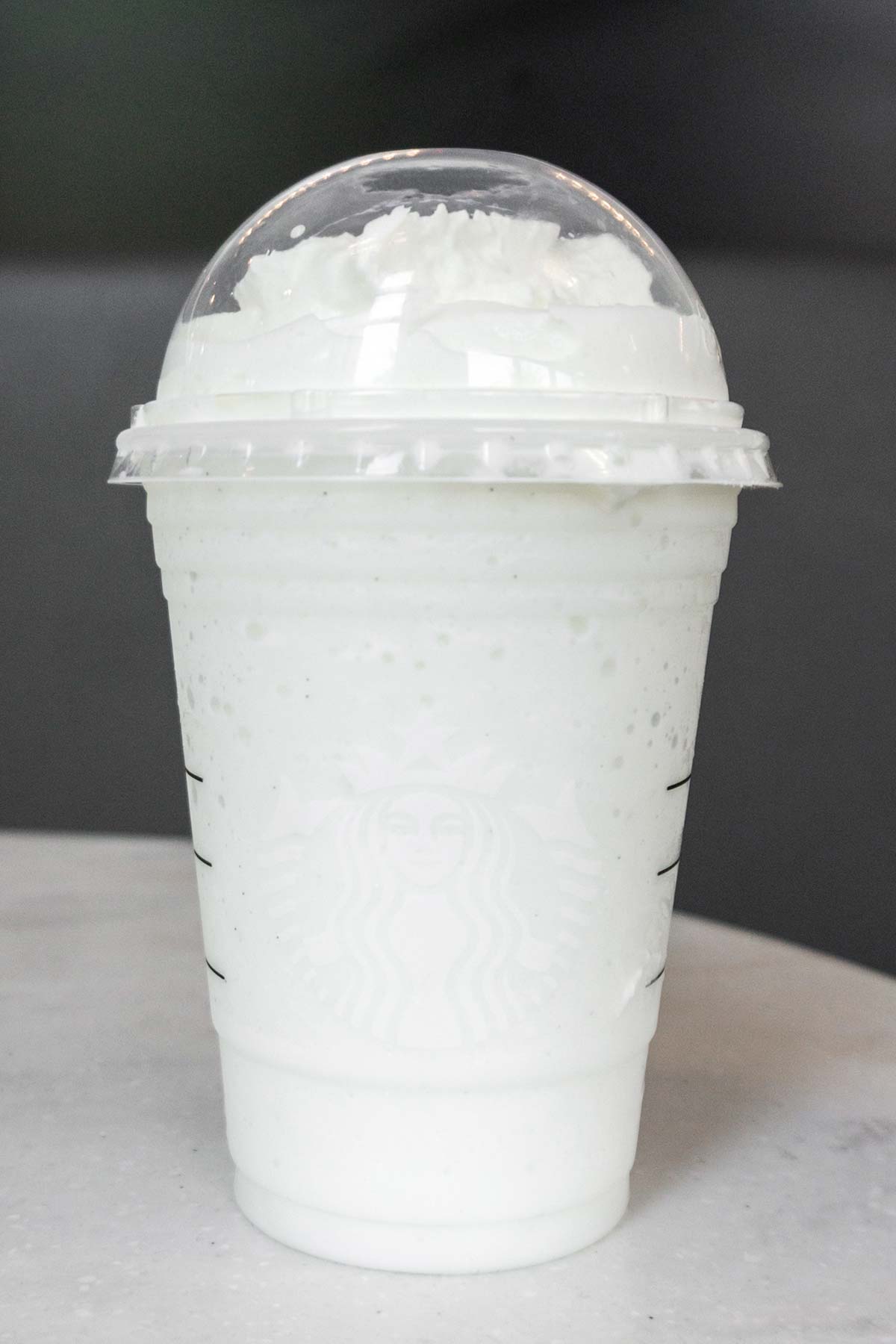 Cotton Candy Frappuccino in a cup with whipped cream.