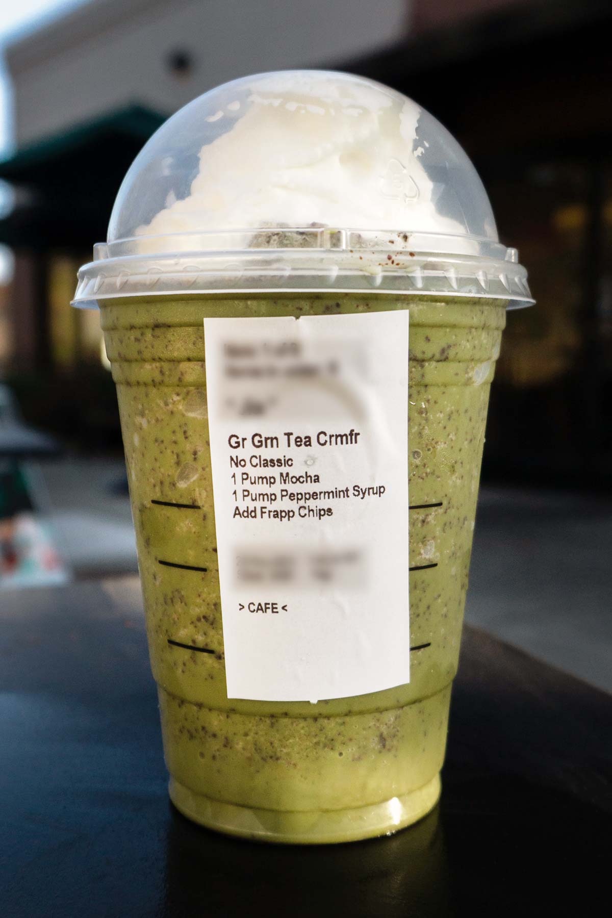 Thin Mint Frappuccino in a grande cup with ingredients on the label.