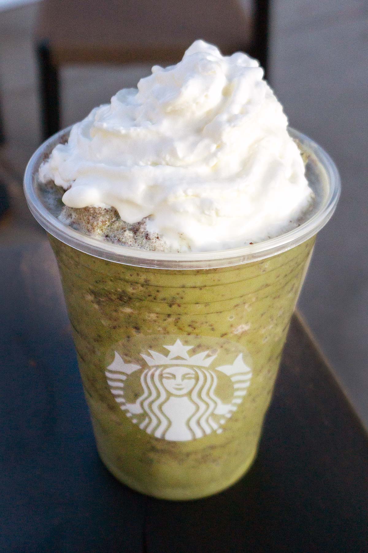 Thin Mint Frappuccino with whipped cream in a grande cup.