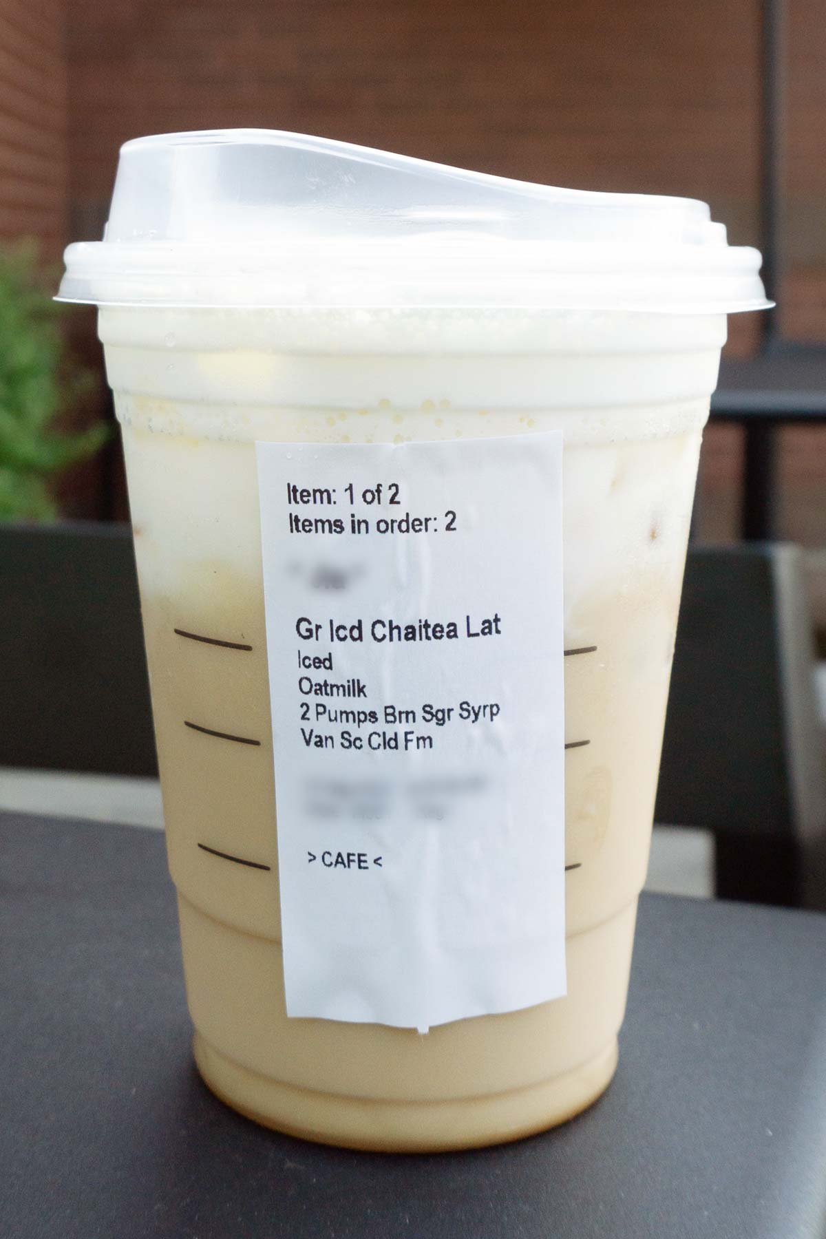 Showing label of a TikTok Iced Chai Latte drink.