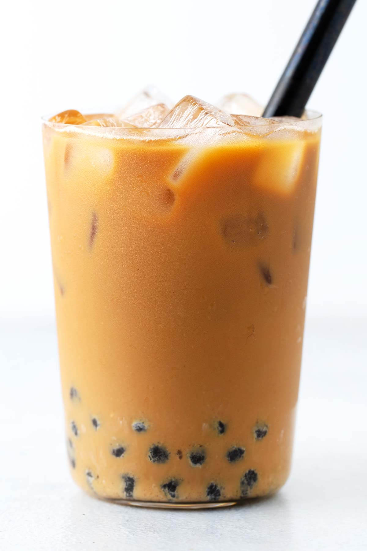 A clear glass of Vietnamese Coffee Boba.
